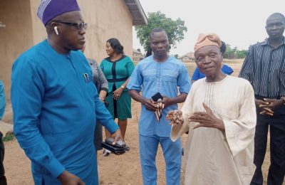 Dr. Nureni and a Community leader in Fenwa Community