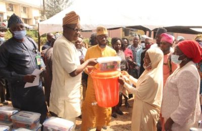 Dr Adeniran distributing COVID-19 kits as Oyo Govt. Distributes First Aid Kits to 250 BESDA Learning Centers