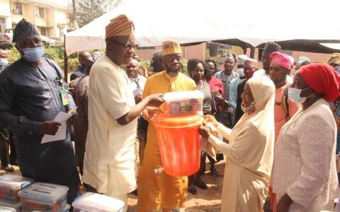 Dr Adeniran distributing COVID-19 kits as Oyo Govt. Distributes First Aid Kits to 250 BESDA Learning Centers
