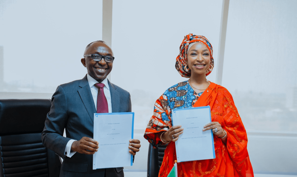 Barr. Hannatu Musa Musawa Minister of Art, Culture, Tourism and the Creative Economy and Dr. Armstrong Takang MD/CEO of Nigeria's Ministry of Finance Incorporated (MOFI) at the signing of Memorandum of Understanding (MOU) at Bank of Industry House 12th March 2024