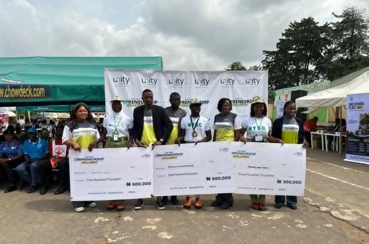The winners of Corpreneurship Challenge pose for a photo with Unity Bank teams in Lagos