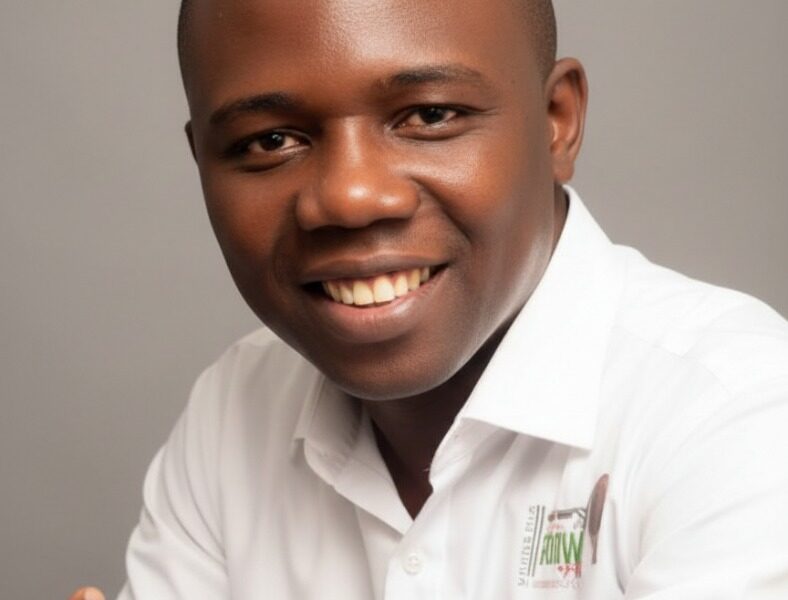 In September 2010, during his undergraduate days, the National Association of Idoma Students, FUT Minna Chapter, then led by Comrade Omaga E. Daniel, conferred on Osisiogu Osikenyi E. the title “Okp’Idoma” — literally “The People’s Leader / Defender of the Idoma”.