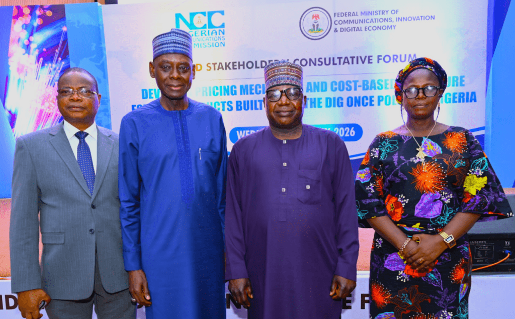 L-R: Prof. Olalekan Yinusa, Executive Director, Policy, Strategy and Research, Nigeria Governors' Forum; Mr. Ayuba Shuaibu, Director, Policy Competition and Economic Analysis, Nigerian Communications Commission, NCC; Engr. Nadungu Gagare, Permanent Secretary, Federal Ministry of Communications, Innovation and Digital Economy; Dr. Helen Aderibigbe Adeniyi, Hon. Commissioner, Ministry of Innovation Science and Technology, Kogi State, during the 2nd Stakeholders ' Consultative Forum on the Study to Develop a Mechanism and Cost-Based Structure for Sharing Duct Built Under The Dig-Once Policy in Nigeria, on the 8th July 2026, at the NCC Annex Office Mbora Abuja.