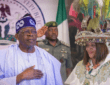 Chief Mrs. Ifeyinwa Arafat Ezenwa, Ijele Nwanyi Igbo Nile, a delegate to the 2014 National Conference, and President Bola Ahmed Tinubu