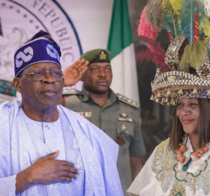Chief Mrs. Ifeyinwa Arafat Ezenwa, Ijele Nwanyi Igbo Nile, a delegate to the 2014 National Conference, and President Bola Ahmed Tinubu
